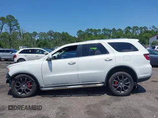 2014 Dodge Durango Limited z VIN 1C4RDJDG2EC383471, wystawiony jako IAAI lot #42739695 z przebiegiem 129 233 mil mil oraz . Historia ofert i sprzedaży dostępna na DreamBid. Obrazek 14.