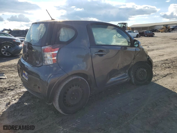 2012 Scion iQ with VIN JTNJJXB0XCJ015980, listed as a Copart auction lot 72237564 with 97,494 mi miles and Salvage Title. Bid and sale history available at carsss.com. Image 3.