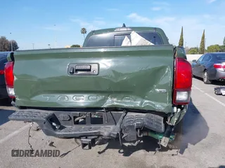 2021 Toyota Tacoma SR z VIN 3TMCZ5AN7MM395940, wystawiony jako IAAI lot #41860127 z przebiegiem 39 338 mil mil oraz . Historia ofert i sprzedaży dostępna na DreamBid. Obrazek 16.