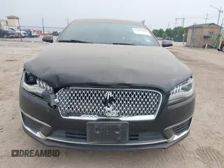 2017 Lincoln MKZ Reserve z VIN 3LN6L5EC4HR619712, wystawiony jako IAAI lot #41899418 z przebiegiem 77 481 mil mil oraz . Historia ofert i sprzedaży dostępna na DreamBid. Obrazek 12.