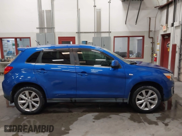2015 Mitsubishi Outlander SE with VIN 4A4AR4AU1FE054804, listed as a IAAI auction lot 42325699 with 106,680 mi miles and . Bid and sale history available at DreamBid. Image 13.