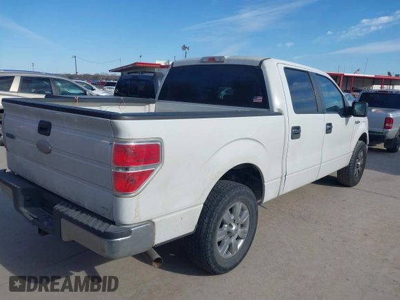 2012 Ford F-150 XL with VIN 1FTFW1CF9CFA94640, listed as a IAAI auction lot 41703729 with 216,291 mi miles. Bid and sale history available at carsss.com. Image 4.