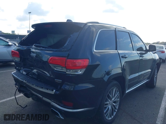 2018 Jeep Grand Cherokee Summit with VIN 1C4RJFJT5JC120523, listed as a IAAI auction lot 42136651 with 75,699 mi miles and . Bid and sale history available at DreamBid. Image 4.