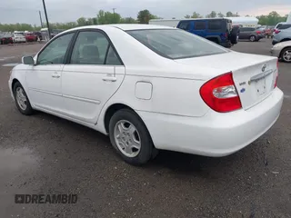 2003 Toyota Camry LE z VIN 4T1BF30K93U044730, wystawiony jako IAAI lot #42044599 z przebiegiem 120 401 mil mil oraz . Historia ofert i sprzedaży dostępna na DreamBid. Obrazek 3.