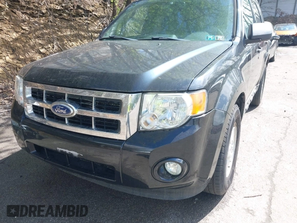 2010 Ford Escape XLT z VIN 1FMCU9DGXAKD25432, wystawiony jako IAAI lot #42195798 z przebiegiem 135 080 mil mil oraz . Historia ofert i sprzedaży dostępna na DreamBid. Obrazek 15.