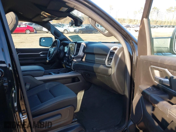 2023 Ram 1500 Big Horn with VIN 1C6SRFFT1PN660751, listed as a IAAI auction lot 41692496 with 30,215 mi miles and . Bid and sale history available at DreamBid. Image 5.