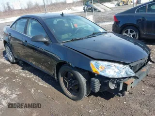 2009 Pontiac G6 w/1SA *Ltd Avail* with VIN 1G2ZG57B894134983, listed as a IAAI auction lot 41728097 with 157,022 mi miles. Bid and sale history available at carsss.com. Image 1.
