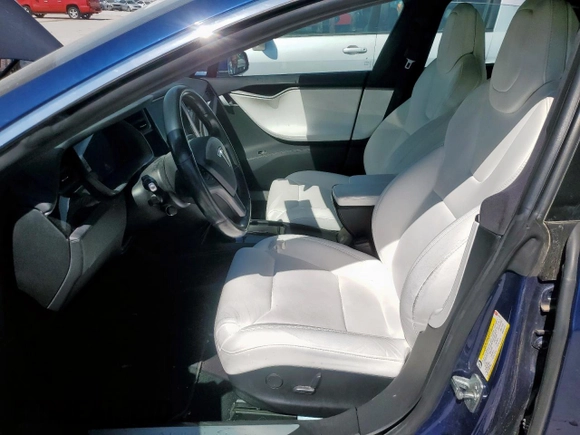2019 Tesla Model S 75D z VIN 5YJSA1E2XKF339553, wystawiony jako Copart lot #52407075 z przebiegiem 121 491 mil mil oraz Szkoda całkowita • Salvage title. Historia ofert i sprzedaży dostępna na DreamBid. Obrazek 7.