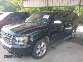 2008 Chevrolet Suburban LTZ with VIN 1GNFK16328R161721, listed as a IAAI auction lot 42130017 with 242,266 mi miles. Bid and sale history available at carsss.com. Image 2.