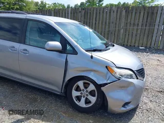 2014 Toyota Sienna LE AAS with VIN 5TDKK3DC4ES511305, listed as a IAAI auction lot 42652770 with 71,808 mi miles and . Bid and sale history available at DreamBid. Image 6.