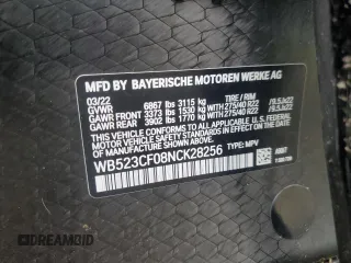 2022 BMW iX xDrive50 z VIN WB523CF08NCK28256, wystawiony jako Copart lot #58966325 z przebiegiem 20 721 mil mil oraz Szkoda całkowita • Salvage title. Historia ofert i sprzedaży dostępna na DreamBid. Obrazek 13.