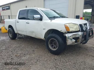 2004 Nissan Titan LE z VIN 1N6AA07B84N520753, wystawiony jako IAAI lot #42490014 z przebiegiem 235 800 mil mil oraz . Historia ofert i sprzedaży dostępna na DreamBid. Obrazek 1.
