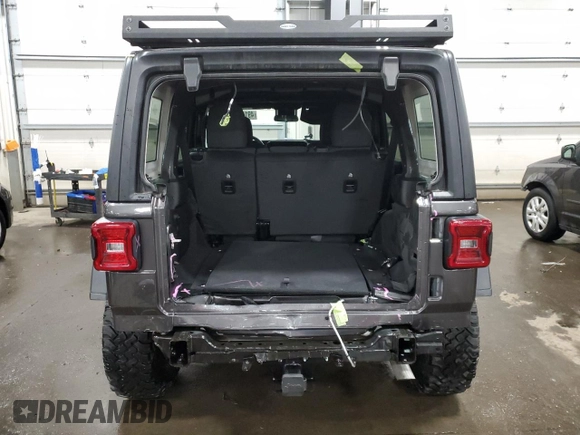 2024 Jeep Wrangler Willys with VIN 1C4PJXDG5RW312580, listed as a Copart auction lot 49144005 with 5,713 mi miles and Salvage Title. Bid and sale history available at carsss.com. Image 6.