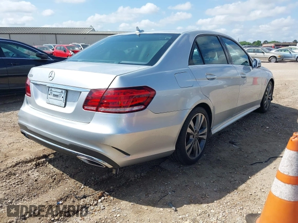 2014 Mercedes-Benz E 350 Sport with VIN WDDHF5KB4EA973595, listed as a IAAI auction lot 42125379 with 162,320 mi miles and . Bid and sale history available at DreamBid. Image 4.