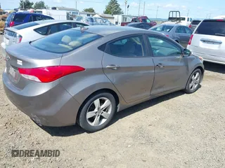 2012 Hyundai Elantra Limited z VIN 5NPDH4AE8CH099976, wystawiony jako IAAI lot #42327888 z przebiegiem 256 867 mil mil oraz . Historia ofert i sprzedaży dostępna na DreamBid. Obrazek 4.