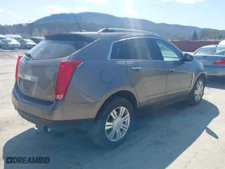 2012 Cadillac SRX Luxury Collection with VIN 3GYFNDE36CS542006, listed as a IAAI auction lot 41976675 with 137,418 mi miles. Bid and sale history available at carsss.com. Image 4.