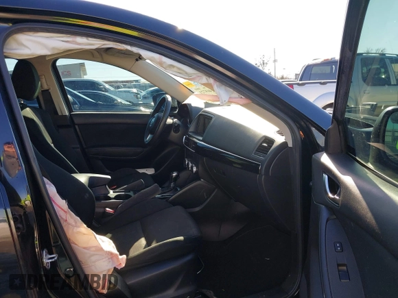 2016 Mazda CX-5 Sport with VIN JM3KE4BY0G0662294, listed as a IAAI auction lot 41469721 with 127,116 mi miles and . Bid and sale history available at carsss.com. Image 5.