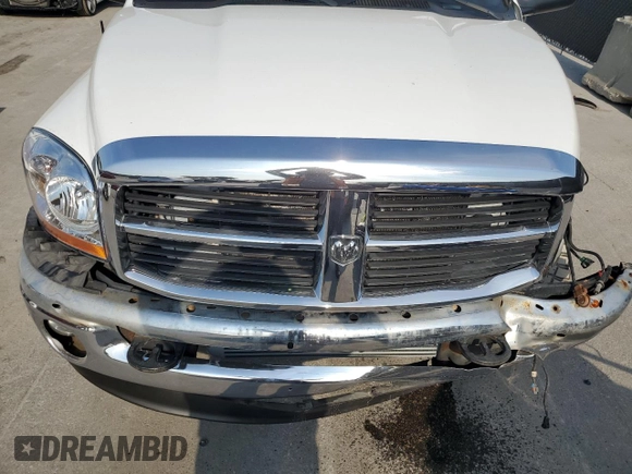 2006 Dodge 2500 SLT z VIN 1D7KS28C76J149088, wystawiony jako Copart lot #58035905 z przebiegiem 157 819 mil mil oraz Szkoda całkowita • Salvage title. Historia ofert i sprzedaży dostępna na DreamBid. Obrazek 11.