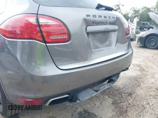 2012 Porsche Cayenne S Hybrid with VIN WP1AE2A25CLA90636, listed as a IAAI auction lot 41922089 with 90,318 mi miles and . Bid and sale history available at DreamBid. Image 12.