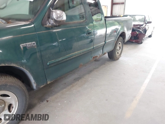 1999 Ford F-150 with VIN 1FTZX1729XNA06022, listed as a IAAI auction lot 42575958 with Not provided miles and . Bid and sale history available at DreamBid. Image 6.