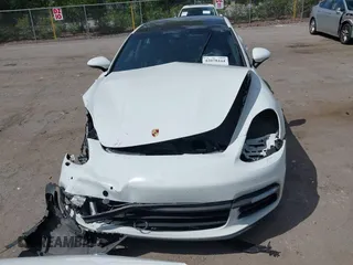 2018 Porsche Panamera 4 E-Hybrid with VIN WP0AE2A74JL130540, listed as a IAAI auction lot 42078444 with 65,981 mi miles and . Bid and sale history available at DreamBid. Image 12.