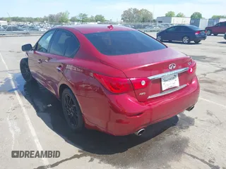 2015 Infiniti Q50 Premium with VIN JN1BV7AR2FM411095, listed as a IAAI auction lot 41932965 with 101,969 mi miles. Bid and sale history available at carsss.com. Image 3.