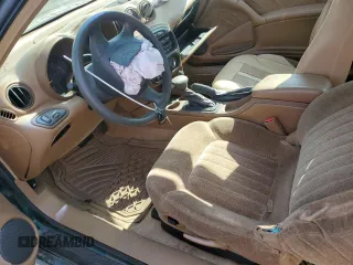 1999 Pontiac Grand Am GT with VIN 1G2NW12E5XM841080, listed as a Copart auction lot 75167674 with 1 mi miles and Salvage Title. Bid and sale history available at carsss.com. Image 7.