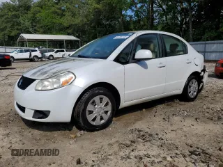 2010 Suzuki SX4 LE z VIN JS2YC5A21A6301727, wystawiony jako Copart lot #55265745 z przebiegiem 164 878 mil mil oraz Szkoda całkowita • Salvage title. Historia ofert i sprzedaży dostępna na DreamBid. Obrazek 1.