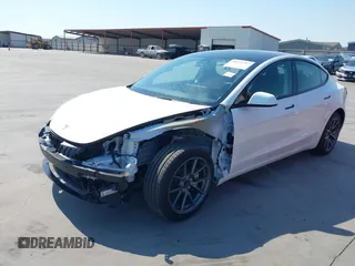2023 Tesla Model 3 with VIN 5YJ3E1EA9PF585632, listed as a IAAI auction lot 40520993 with 7,775 mi miles and . Bid and sale history available at DreamBid. Image 2.