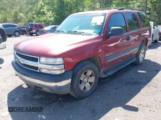 2002 Chevrolet Tahoe LT z VIN 1GNEC13Z72R276808, wystawiony jako IAAI lot #42133581 z przebiegiem 269 355 mil mil oraz . Historia ofert i sprzedaży dostępna na DreamBid. Obrazek 2.