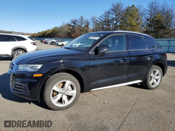 2018 Audi Q5 Premium with VIN WA1ANAFY5J2006403, listed as a Copart auction lot 87045534 with 99,215 mi miles and Salvage title. Bid and sale history available at DreamBid. Image 1.