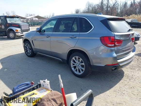 2015 BMW X5 xDrive35i with VIN 5UXKR0C53F0K60910, listed as a IAAI auction lot 41857733 with 153,583 mi miles. Bid and sale history available at carsss.com. Image 3.