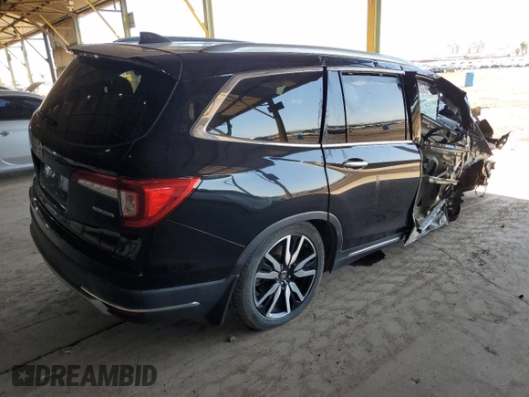 2021 Honda Pilot Touring 8-Passenger with VIN 5FNYF5H96MB007074, listed as a Copart auction lot 54445795 with Not Provided miles and Salvage Title. Bid and sale history available at DreamBid. Image 3.