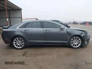 2015 Lincoln MKZ z VIN 3LN6L2G99FR604894, wystawiony jako IAAI lot #41433264 z przebiegiem 262 472 mil mil oraz . Historia ofert i sprzedaży dostępna na DreamBid. Obrazek 14.