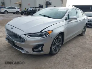 2019 Ford Fusion Titanium with VIN 3FA6P0D9XKR206465, listed as a IAAI auction lot 41577306 with 70,668 mi miles. Bid and sale history available at carsss.com. Image 2.
