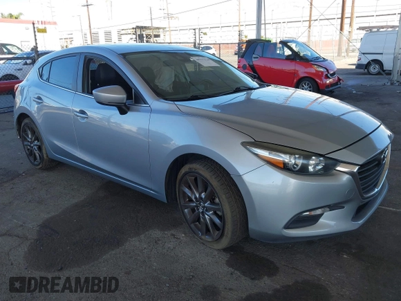 2018 Mazda 3 Touring with VIN 3MZBN1L31JM163466, listed as a IAAI auction lot 40777124 with 101,497 mi miles and . Bid and sale history available at carsss.com. Image 1.