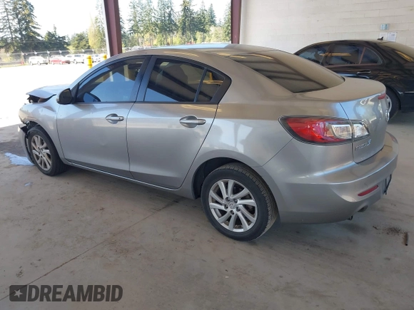 2012 Mazda Mazda3 i Touring with VIN JM1BL1V76C1595589, listed as a IAAI auction lot 42047555 with 139,427 mi miles. Bid and sale history available at carsss.com. Image 3.