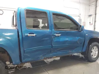 2011 GMC Canyon SLT with VIN 1GTH6NFP8B8115436, listed as a IAAI auction lot 41676023 with 148,478 mi miles. Bid and sale history available at carsss.com. Image 6.