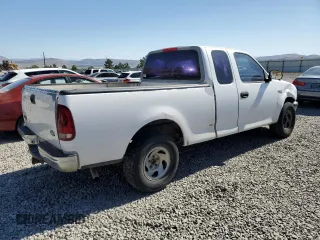 1998 Ford F-150 with VIN 1FTZX1720WKA20813, listed as a Copart auction lot 63852215 with 215,729 mi miles and Salvage title. Bid and sale history available at DreamBid. Image 3.