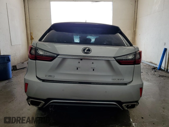 2016 Lexus RX 350 with VIN 2T2BZMCA1GC032722, listed as a Copart auction lot 59550625 with 124,611 mi miles and Salvage title. Bid and sale history available at DreamBid. Image 6.