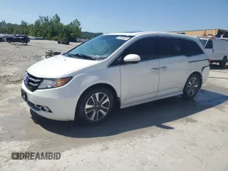 2014 Honda Odyssey Touring with VIN 5FNRL5H98EB097312, listed as a Copart auction lot 63094865 with 234,375 mi miles and Salvage title. Bid and sale history available at DreamBid. Image 1.