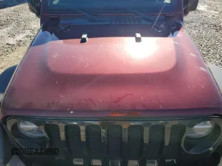 2021 Jeep Wrangler Unlimited Willys with VIN 1C4HJXDG9MW594591, listed as a Copart auction lot 81740454 with 48,070 mi miles and Salvage title. Bid and sale history available at DreamBid. Image 12.