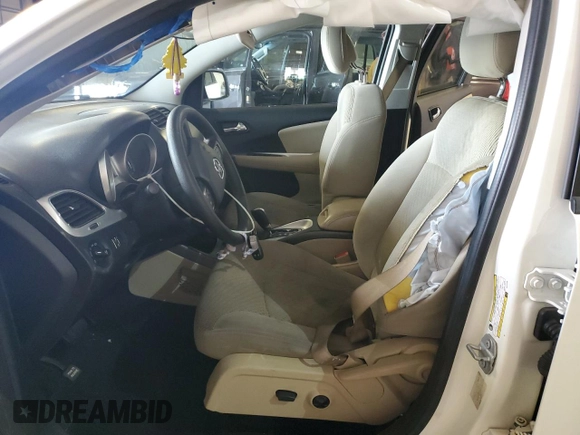 2017 Dodge Journey SXT with VIN 3C4PDCBG0HT572165, listed as a Copart auction lot 56673495 with Not provided miles and Salvage title. Bid and sale history available at DreamBid. Image 7.