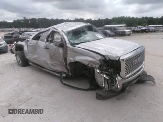 2016 GMC Sierra 2500HD SLE z VIN 1GT12SEG1GF220240, wystawiony jako IAAI lot #33013456 z przebiegiem Nie podano mil oraz . Historia ofert i sprzedaży dostępna na DreamBid. Obrazek 1.