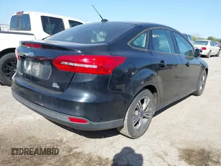 2016 Ford Focus SE with VIN 1FADP3FE7GL202284, listed as a IAAI auction lot 42014457 with 130,000 mi miles. Bid and sale history available at carsss.com. Image 4.