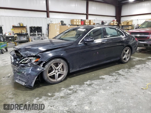 2017 Mercedes-Benz E 300 Luxury with VIN WDDZF4JB0HA039244, listed as a Copart auction lot 56474805 with 135,674 mi miles and Salvage title. Bid and sale history available at DreamBid. Image 1.