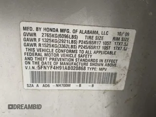 2010 Honda Pilot Touring with VIN 5FNYF4H91AB020868, listed as a IAAI auction lot 41783104 with 298,022 mi miles and . Bid and sale history available at carsss.com. Image 9.