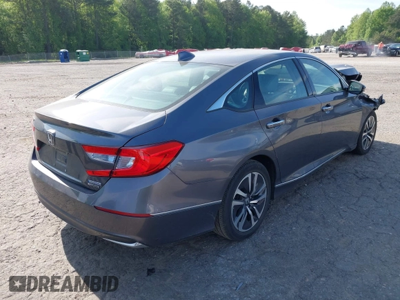 2020 Honda Accord Touring with VIN 1HGCV3F90LA013434, listed as a IAAI auction lot 42075502 with 56,645 mi miles and . Bid and sale history available at DreamBid. Image 4.