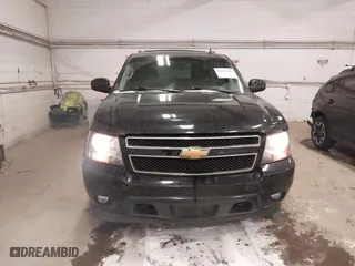 2013 Chevrolet Suburban LT with VIN 1GNSKJE75DR167705, listed as a IAAI auction lot 41521409 with 228,411 mi miles. Bid and sale history available at carsss.com. Image 12.