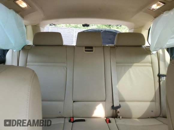 2012 BMW X5 35i with VIN 5UXZV4C5XCL761370, listed as a Copart auction lot 59436845 with 124,722 mi miles and Salvage title. Bid and sale history available at DreamBid. Image 10.
